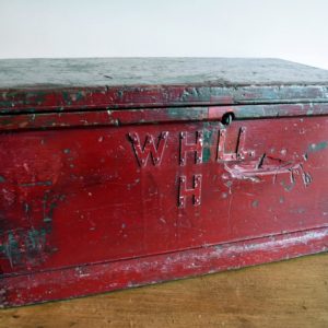 Antique red storage trunk