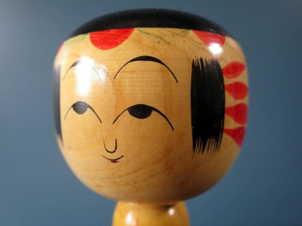 Vintage Japanese wooden Kokeshi doll - Hijori style with chrysanthemum design