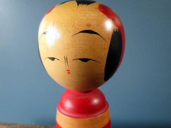 Japanese wooden Kokeshi doll - Sakunami style with chrysanthemum design