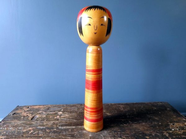 Japanese vintage Kokeshi doll in Tsuchiyu style with tapered striped body