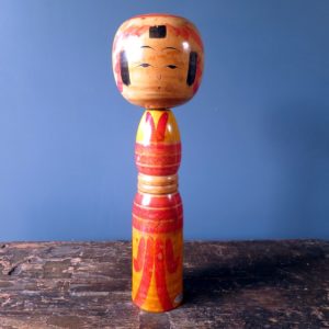 Japanese wooden Kokeshi doll - colourful Yajiro design with rattle