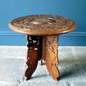 Indian carved wooden circular occasional table