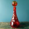 Rossini genie bottle decanter in Amberina Empoli glass with thumbprint pattern