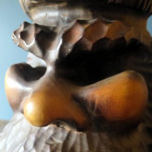 Rare Japanese (Hokkaido) hand-carved sculpture of Ainu man with eagle head-dress
