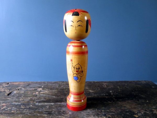 Japanese Kokeshi doll - Sakunami style with modern mascot